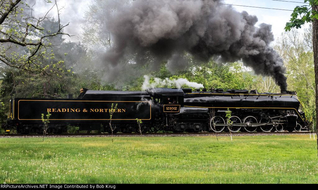 RBMN 2102 in profile at Hecla.  Railroad President Andy Muller at the throttle